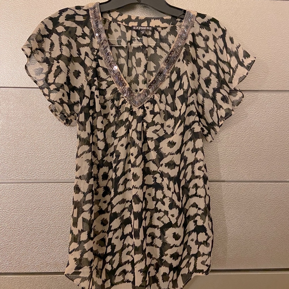 Sparkle Ruffle Leopard Express Top